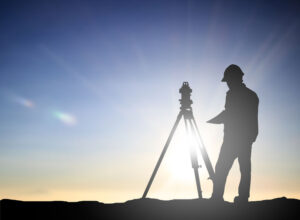 A man completing a survey as the sun sets